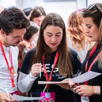 Image of students taking notes.